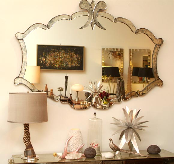 Beautiful taxidermied zebra leg mounted on a silver plate base and collar, very chic.