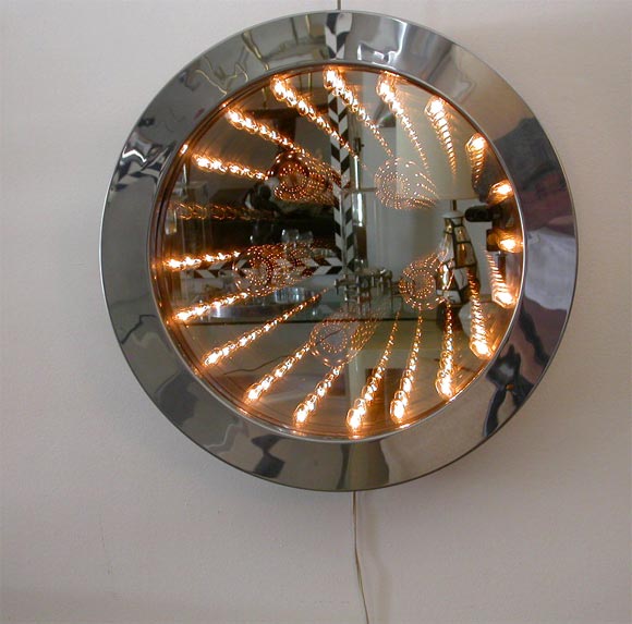 C jere round infinity mirror signed and dated 1977.
