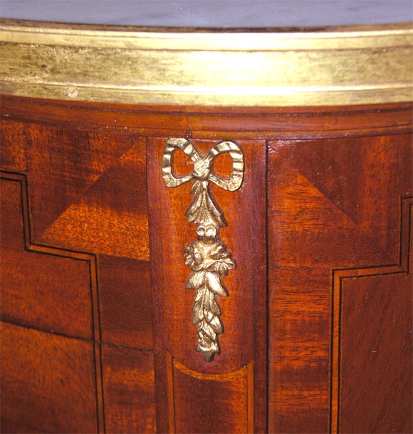 French A Pair of Louis XVI style Mahogany and Walnut small side tables. For Sale