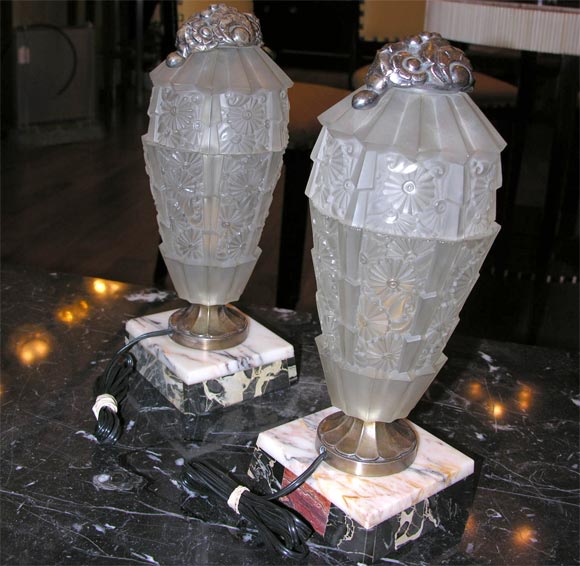 Pair of bronze-mounted pressed glass lights on marble bases attributed Genet et Michon.