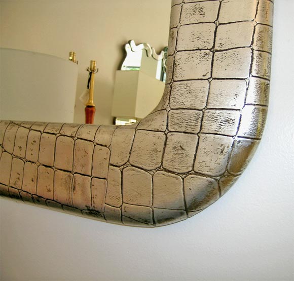 Milo Baughman for Thayer Coggin large silver leaf over embossed crocodile leather mirror.

Milo Baughman (1925-2003)

American furniture designer, born Kansas, and active California and Utah. Baughman’s family moved to Long Beach, California in