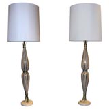 Pair of tall glass lamps with gold stripes