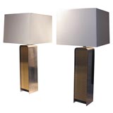 Pair of brushed chrome and woven cane lamps by Laurel