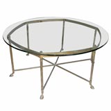 Glass top brass coffee table