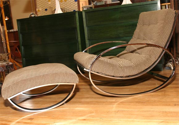 Ovoid chrome rocker with matching ottoman