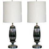 pair of black cut-to-clear glass table lamps