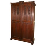 Carved oak gothic cabinet
