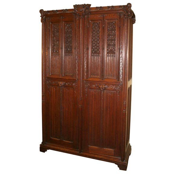 Carved oak gothic cabinet For Sale