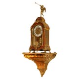 Louis XV style brass-mounted clock and bracket
