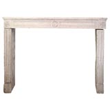 Antique Louis XVI stone mantel