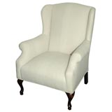 1920S DIMINUTIVE WING CHAIR IN 19THC FRENCH LINEN