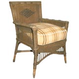 1920 ORIGINAL BROWN PAINTED WICKER CHAIR WITH BLANKET CUSHION