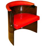 Smoke plexiglass and red vinyl barrel chair
