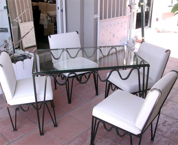 A Wonderful Metal and Glass Table and Four Chairs