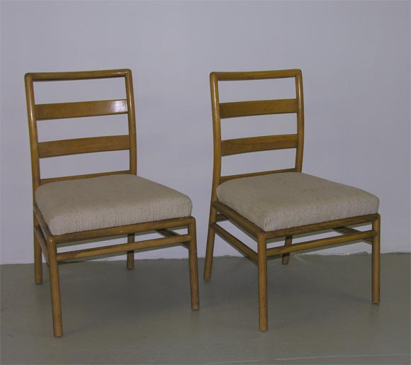 A large set of fourteen ladder back dining chairs, mod. no. 1685 (side chair and armchair) designed by T.H. Robsjohn-Gibbings for Widdicomb. U.S.A., circa 1950. [DUF0698] [DUF0699]