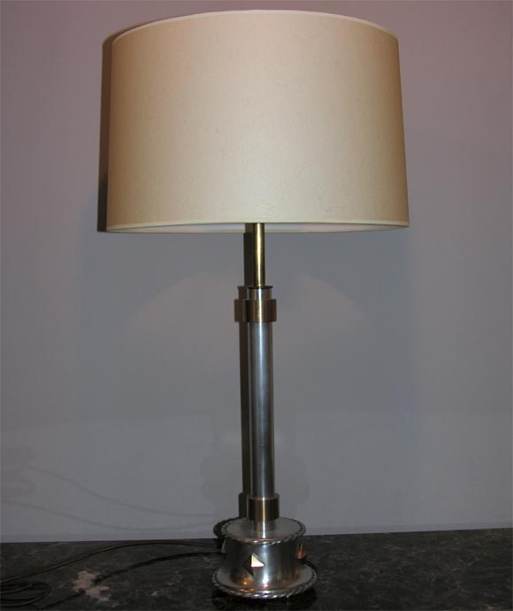 A pair of Art Deco table lamps crafted of polished aluminum and brass.
New sockets and rewired
Shades not included