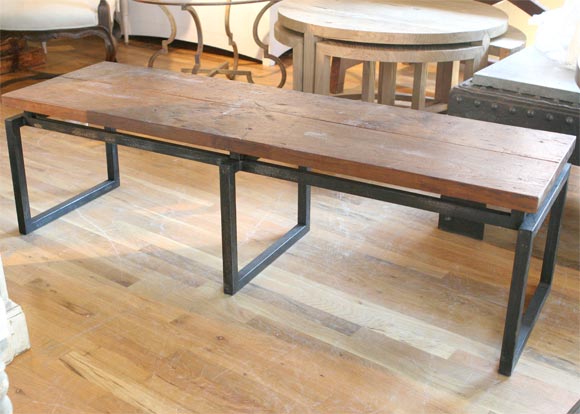 Reproduction bench made with antique teak top and iron base.can be ordered in custom sizes and with oak as well as teak tops.