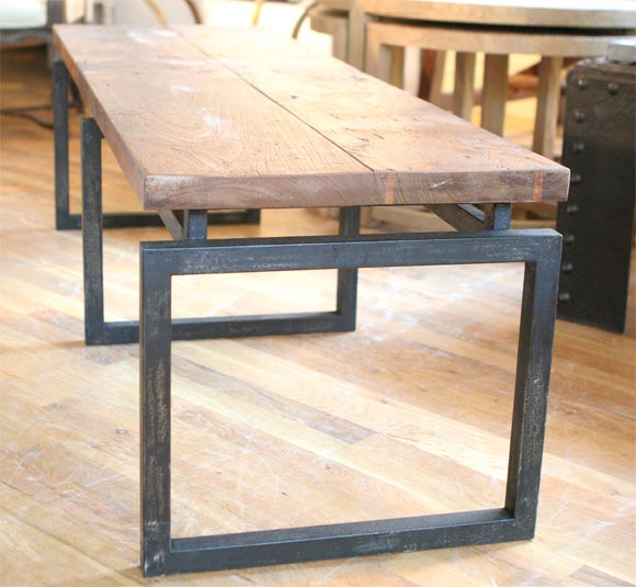 Contemporary teak and iron bench
