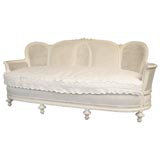 C. 1920 Double Caned Curved White Sofa