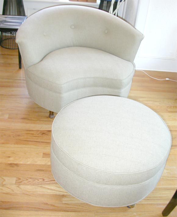 Upholstered chair and ottoman on casters