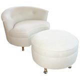 Upholstered chair and ottoman on casters
