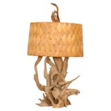 A Driftwood and Woven Palm Table Lamp