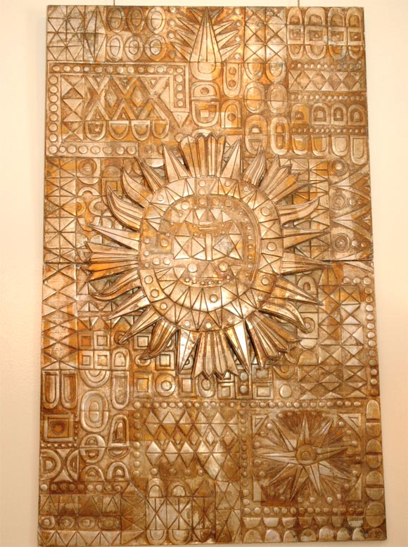 There were two of these panels on the ship but only one will be available here for sale. The metal surfacing is a combination of gold and silver. The gold patina was painted on by Luzzati, himself. There are two large flat pieces with metal mounts