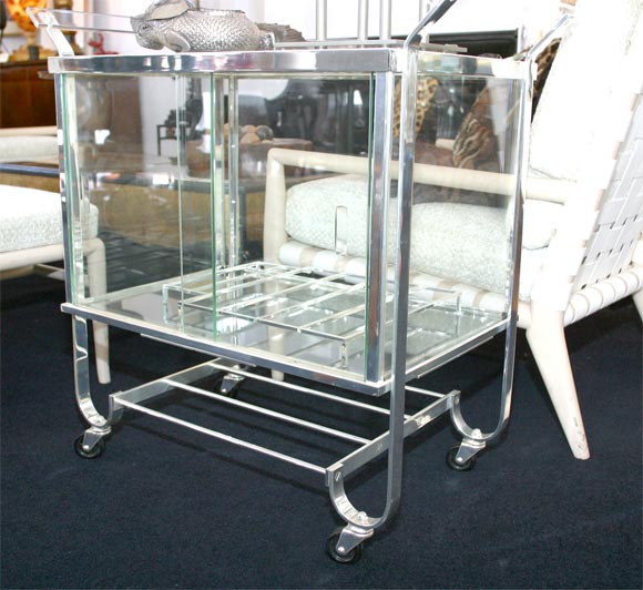 A Silverplate, Glass, and Lucite Drinks Trolley
