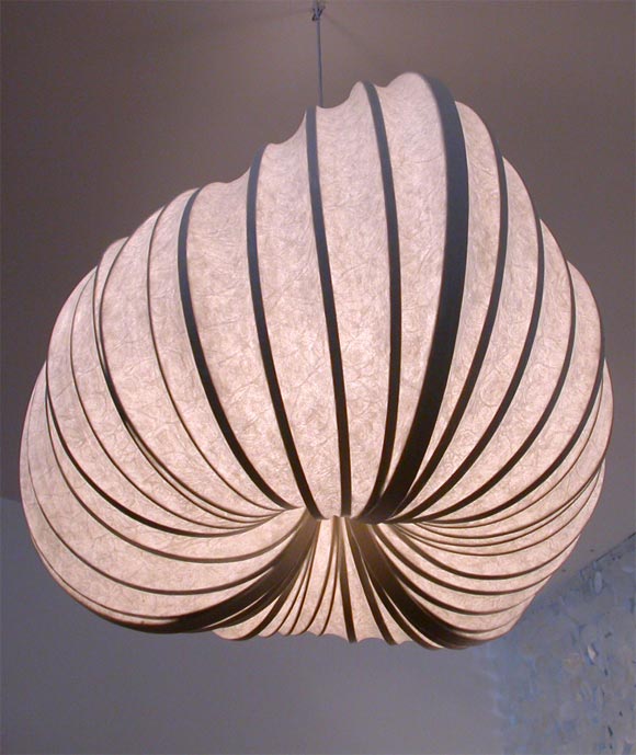 This is one of a whole line of light sculpture by Stephen White.  No two are the same.  Please inquire about commissions.