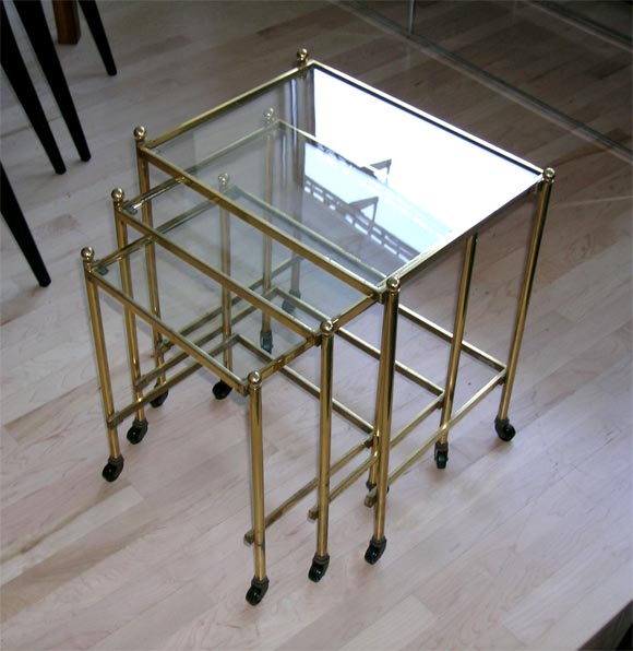 Solid Brass nesting tables from  Doris Dessauer