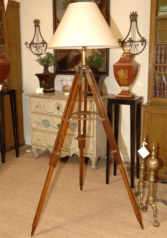 A 19th Century Walnut and Brass Surveyer's Tripod as Standing Lamp with Shade.