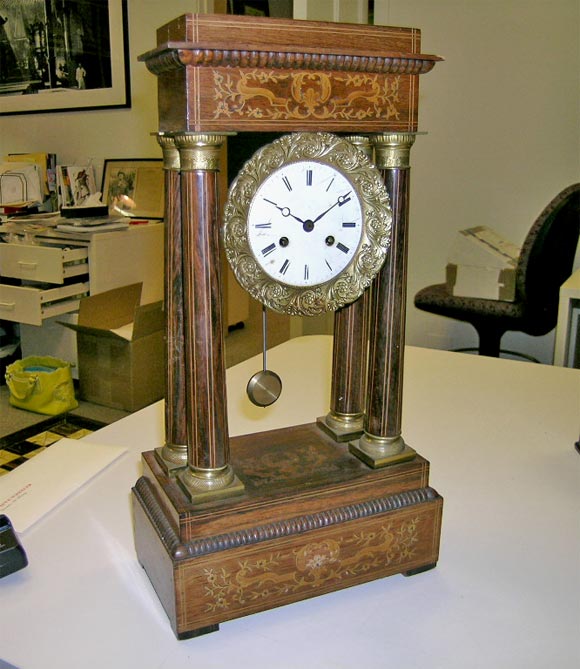 A Louis Phillipe mahogany ormolu-mounted mantel clock