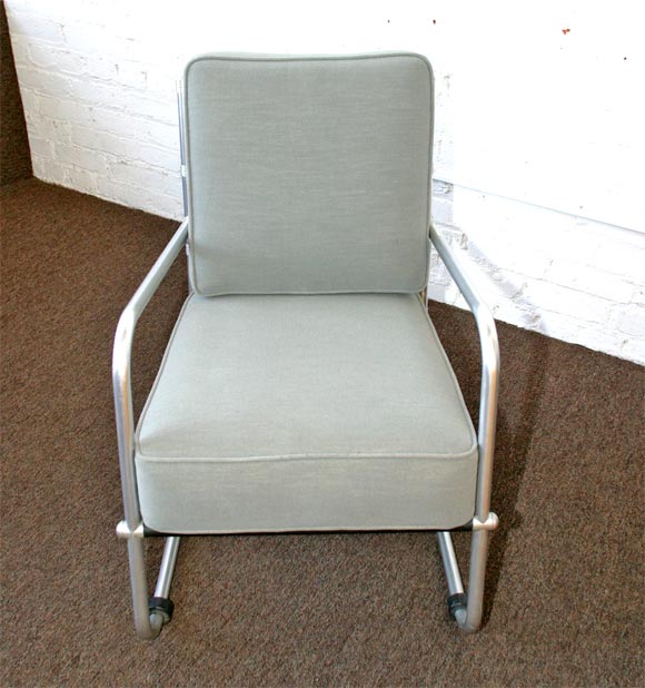 Lounge chair designed by Warren Macarthur. circa 1935. Made in New York City. Aluminum frame with upholstered cushions. Original rubber feet.