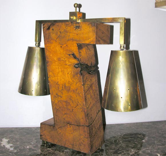A pair of sculptural form architectural table lamps, produced circa 1950s, handcrafted of wood and brass.