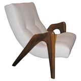 Kagan-style walnut lounge chair
