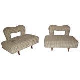 pair of upholstered low chairs with ribbon back