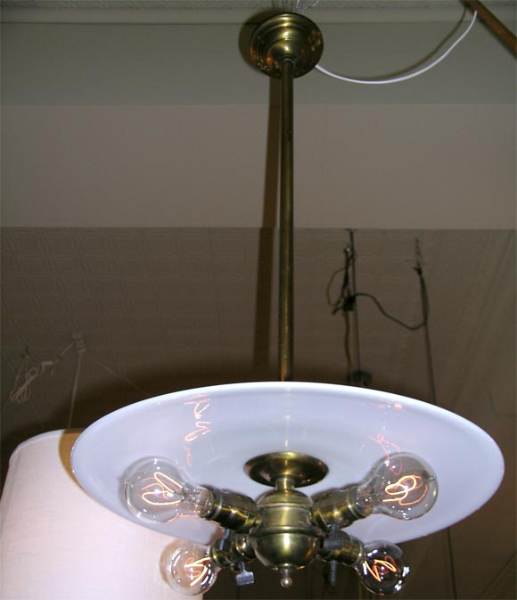 Early electric fixtures with glass disc and 4 light cluster
