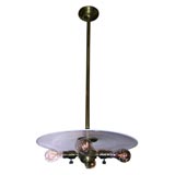 Early electric fixtures with glass disc and 4 light cluster