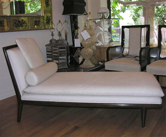 Robsjohn-Gibbings white upholstered chaise lounge.