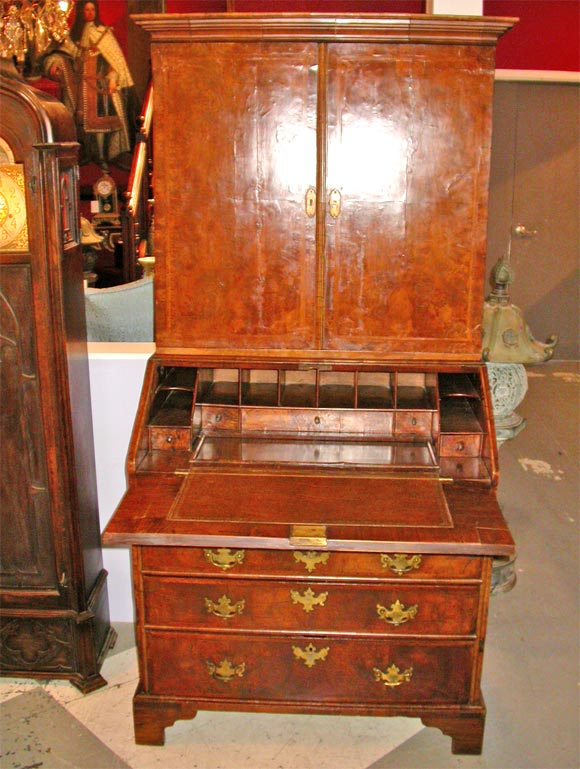 Inlaid.  Burlwood. Early secretary.  Some restoration.  Very good work.  Leather writing desk area.