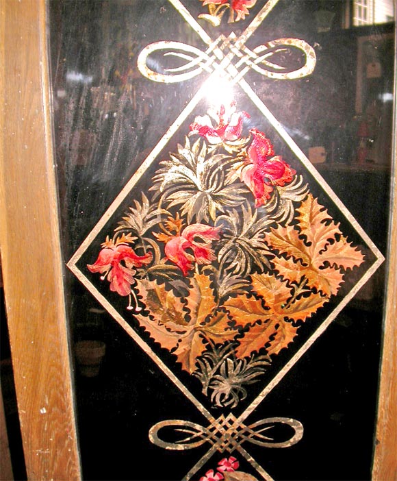 Two wood framed reversed painted on glass French panels, formerly doors.