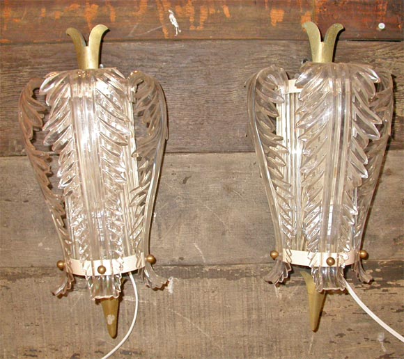 Pair of French 1940s leaf form Lucite wall sconces by Bagues.
