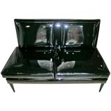 Patent leather settee by Paul McCobb