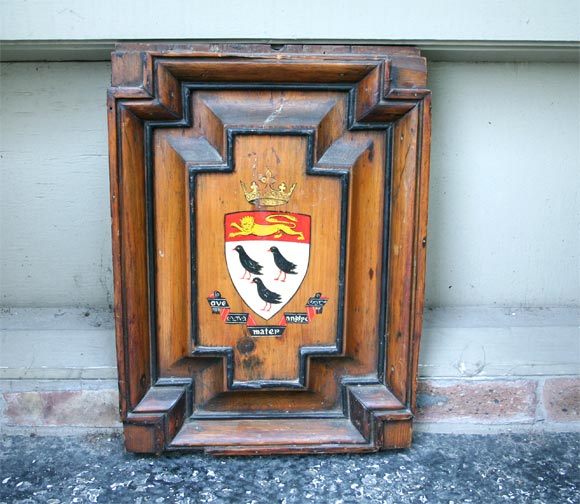 Very handsome English pine armorial plaque with painted decoration. Appears to have once been part of a paneled room.