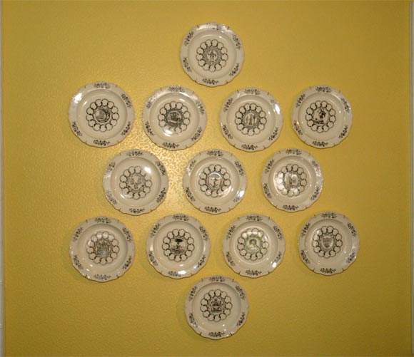 Set of 13 Wedgewood Plates, First Edition dated 1975, of the 13 original cologies.