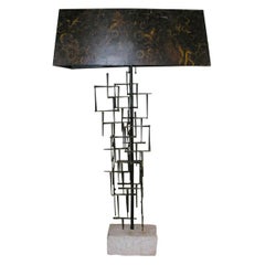 A Fantoni Travertine 
Iron Abstract Sculptural Table Lamp, 1954
