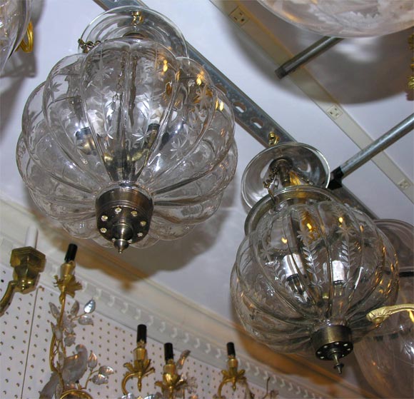 pair of glass pumpkin bell jar lanterns