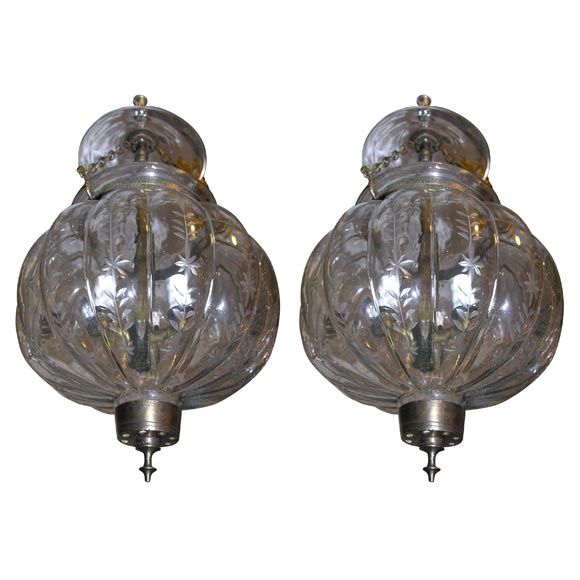 pair of glass pumpkin bell jar lanterns