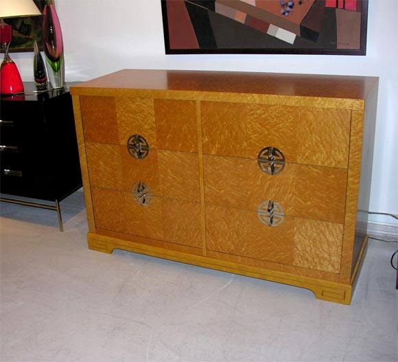 Six drawer burled wood dresser with Asian inspired nickel hardware manufactured by Starline furniture company Los Angeles