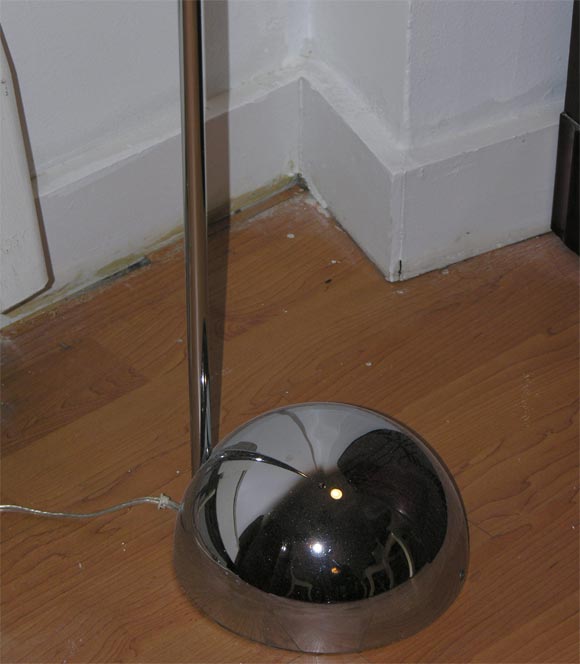 A great chrome floor lamp designed by famed lighting designer, Robert Sonneman. The lamp is often referred to as the 